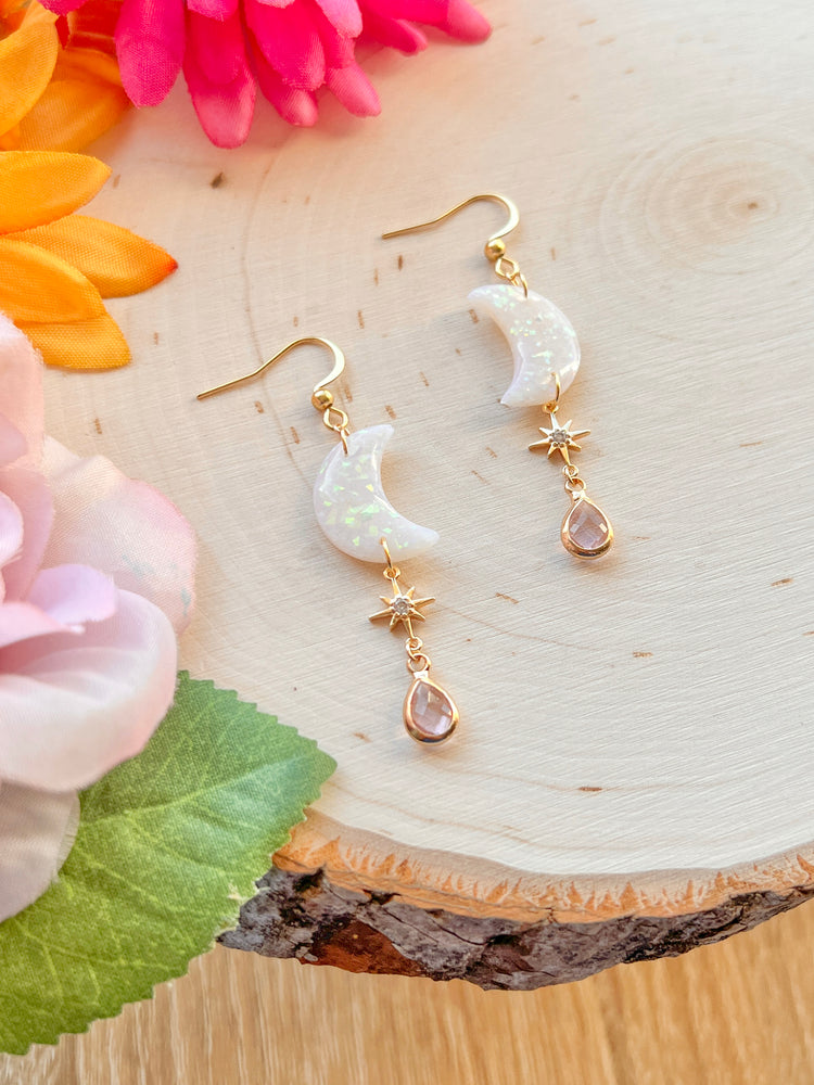 Handcrafted opal moon earrings with soft colorful glow, perfect for any occasion